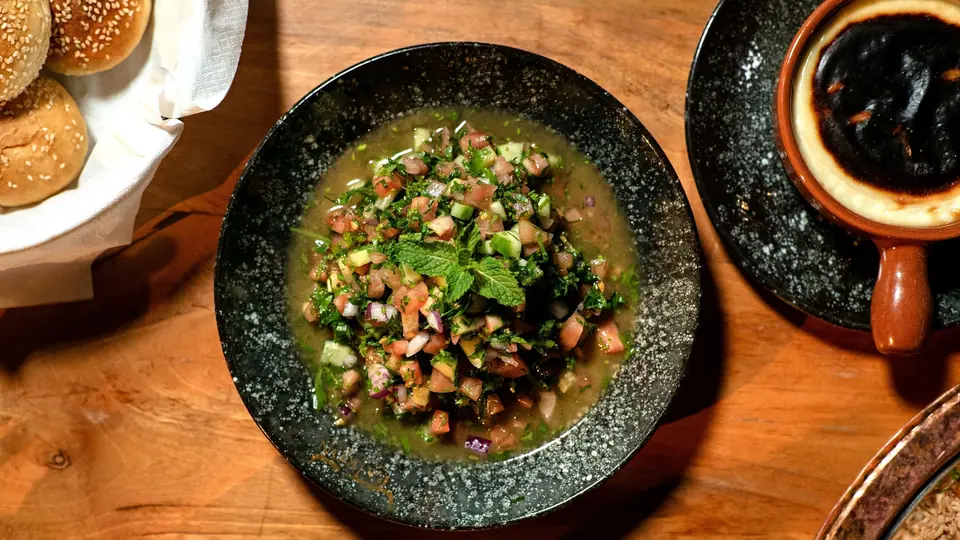 Fresh Tomato Cucumber Salad with Mint Garnish