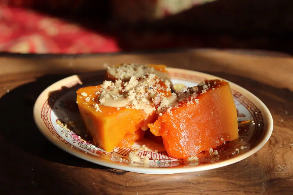 Traditional pumpkin dessert garnished with nuts