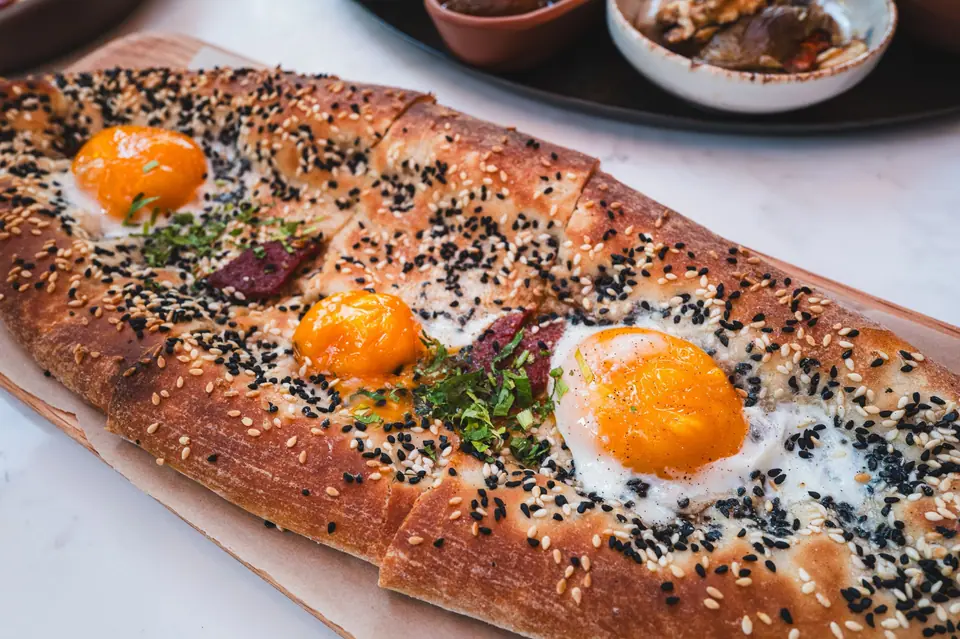 Delicious Turkish Pide with Eggs and Spices
